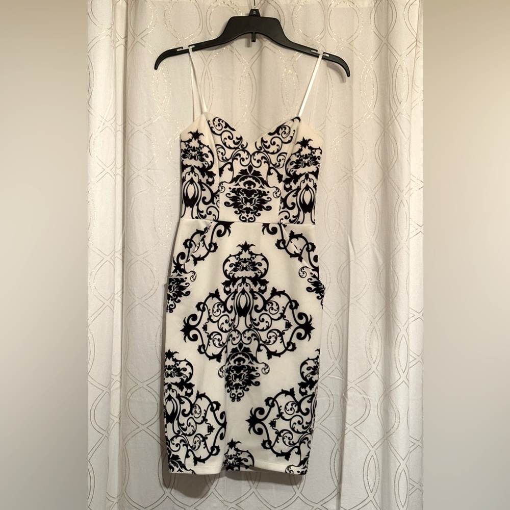 B. Darling black and white cocktail dress w/pockets - size 5/6 (juniors)